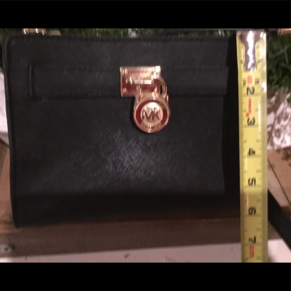 Michael Kors cross body purse.